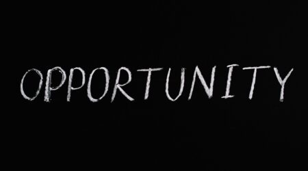 "Opportunity" written on a blackboard in white chalk