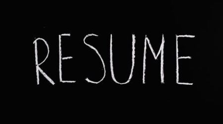 The word "Resume" written in white chalk on a black background