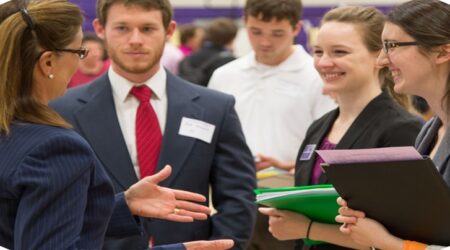 A group of professionals at a job fair